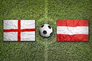 Image showing England vs. Austria flags on soccer field