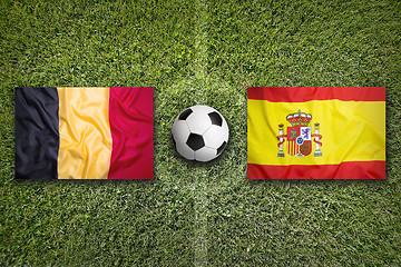 Image showing Belgium vs. Spain flags on soccer field