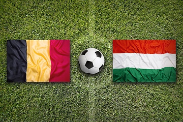 Image showing Belgium vs. Hungary flags on soccer field