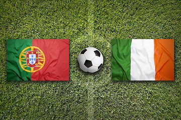 Image showing Portugal vs. Ireland flags on soccer field