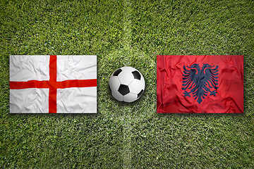 Image showing England vs. Albania flags on soccer field