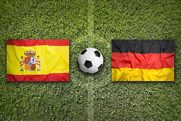 Image showing Spain vs. Germany flags on soccer field