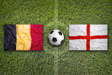 Image showing Belgium vs. England flags on soccer field