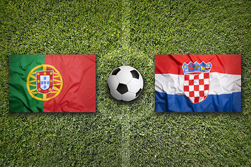 Image showing Portugal vs. Croatia flags on soccer field