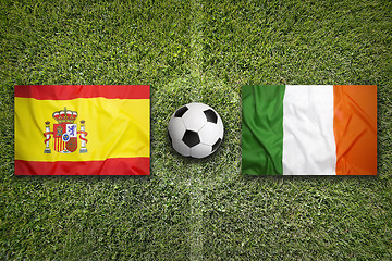 Image showing Spain vs. Ireland flags on soccer field