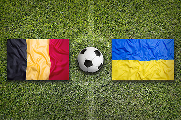 Image showing Belgium vs. Ukraine flags on soccer field