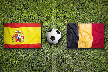 Image showing Spain vs. Belgium flags on soccer field