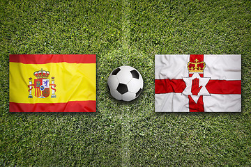 Image showing Spain vs. Northern Ireland flags on soccer field