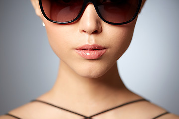 Image showing close up of beautiful woman in black sunglasses