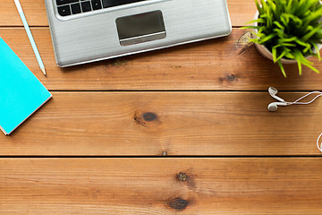 Image showing close up of laptop computer on wooden table