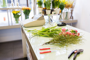 Image showing close up of floristic tools on flower shop counter