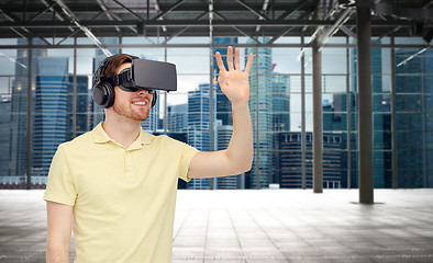 Image showing happy man in virtual reality headset or 3d glasses