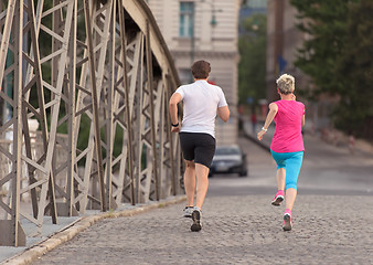 Image showing couple jogging