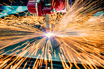 Image showing CNC Laser cutting of metal, modern industrial technology.