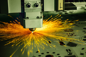 Image showing CNC Laser cutting of metal, modern industrial technology.