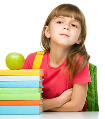 Image showing Little girl with her books