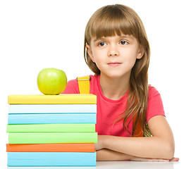 Image showing Little girl with her books