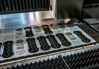 Image showing CNC Laser cutting of metal, modern industrial technology.