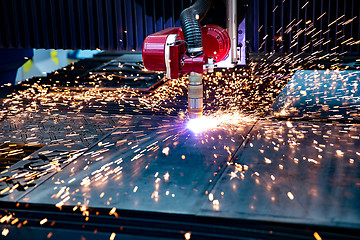 Image showing CNC Laser cutting of metal, modern industrial technology.