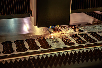 Image showing CNC Laser cutting of metal, modern industrial technology.