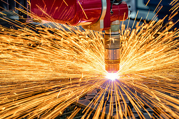 Image showing CNC Laser cutting of metal, modern industrial technology.