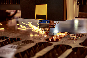 Image showing CNC Laser cutting of metal, modern industrial technology.