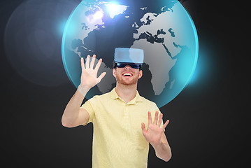 Image showing happy man in virtual reality headset or 3d glasses