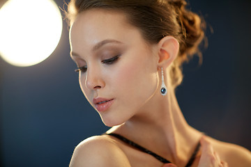 Image showing beautiful young asian woman with earring