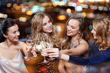 Image showing happy women with champagne glasses at night club