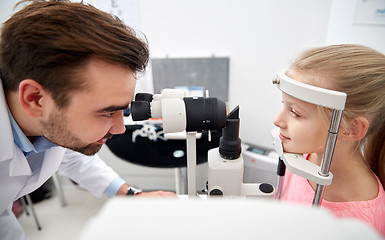 Image showing optician with tonometer and patient at eye clinic