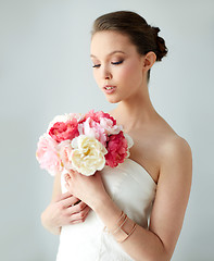 Image showing beautiful asian woman with flower and jewelry