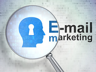 Image showing Marketing concept: Head With Keyhole and E-mail Marketing with optical glass