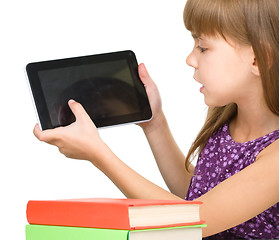 Image showing Young girl is showing tablet