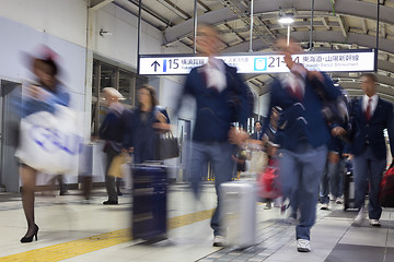 Image showing Business people traveling by Tokyo metro.