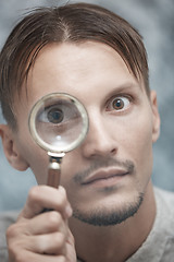 Image showing Man with magnifying glass