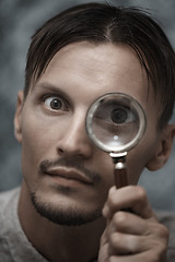 Image showing Man with magnifying glass