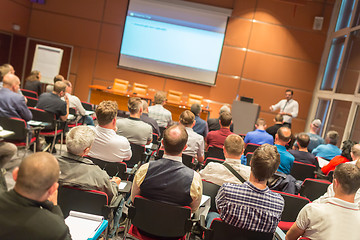 Image showing Business speaker giving a talk in conference hall.