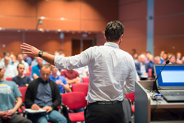 Image showing Public speaker giving talk at Business Event.