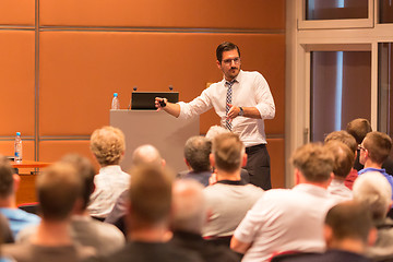 Image showing Business speaker giving a talk in conference hall.