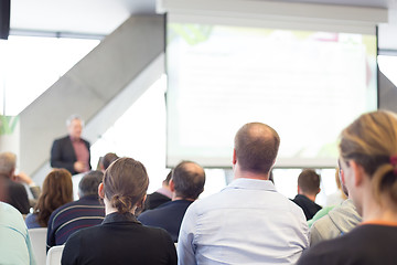 Image showing Male speeker having talk at public event.