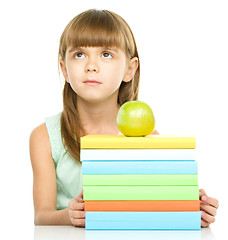 Image showing Little girl with her books