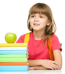 Image showing Little girl with her books