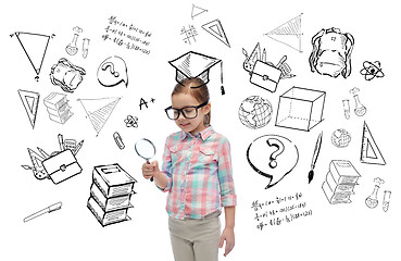 Image showing little girl in eyeglasses with magnifying glass