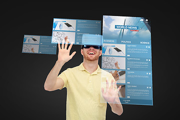 Image showing happy man in virtual reality headset or 3d glasses