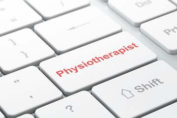 Image showing Medicine concept: Physiotherapist on computer keyboard background