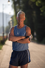 Image showing portrait of handsome senior jogging man