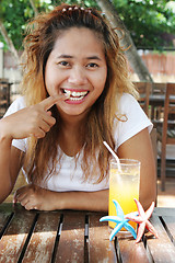 Image showing Girl drinking juice