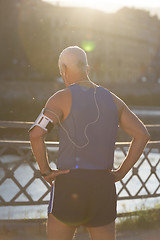 Image showing portrait of handsome senior jogging man