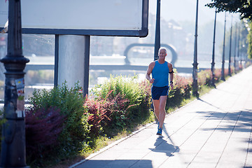 Image showing handsome senior man  jogging