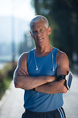 Image showing portrait of handsome senior jogging man